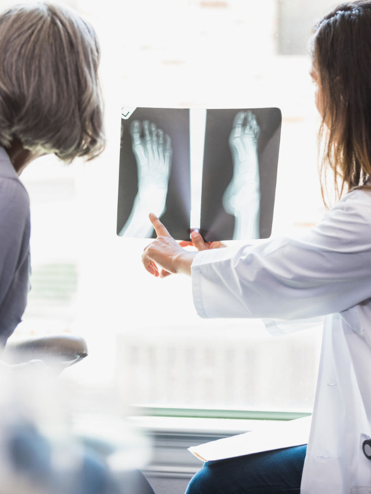 xrays of feet with doctors examination