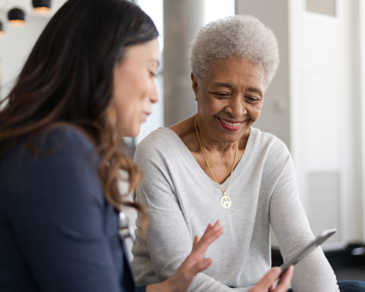 older black woman with younger white lady